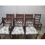 A set of six dining room chairs along with one other