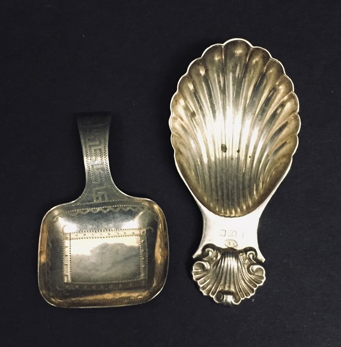 Four hallmarked silver caddy spoons along with a silver feeding spoon. - Image 2 of 3
