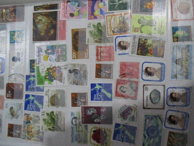 An album of worldwide stamps - Image 29 of 47