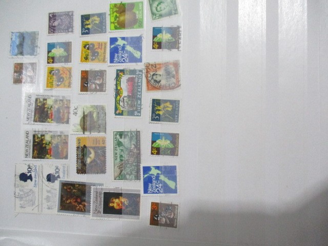 An album of worldwide stamps - Image 30 of 47