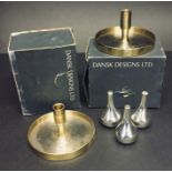 A pair of boxed Dansk Design Ltd candlesticks along with 3 Dansk silver plated taper holders
