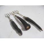 Three horn handled muffin forks