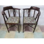 A pair of Edwardian corner chairs