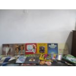A collection of various records including, Elton John, Elvis Presley, Cliff Richard, Abba, The