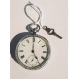 A hallmarked silver pocket watch with key