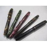 A collection of five fountain pens including Cadet, Mentmore etc