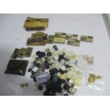 A quantity of buttons including a pair of 9ct gold buttons (1.21g) along with razor blades and a