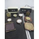 Two vintage alarm clocks along with various travel clocks etc.