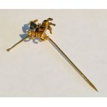 A 9 ct gold stick pin in the form of a jousting knight on horseback, 5.45g