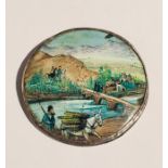 An SCM mounted enamelled brooch depicting figures at a village in mountainous scenery