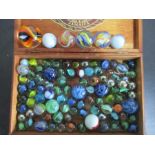 A collection of vintage marbles including some Victorian examples