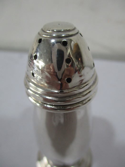 A hallmarked silver pepperette along with a novelty silver plated toast rack and a figure of a duck - Image 9 of 12