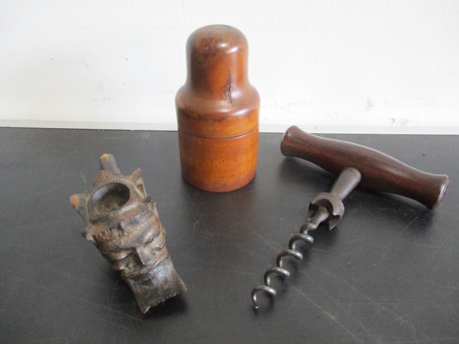 An antique corkscrew, treen and a pipe