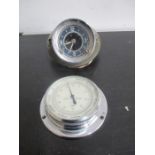 A Smiths car clock along with an aeroplane "Auto-Aneroid" barometer
