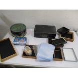 A collection of display boxes, tins etc.