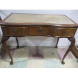 A serpentine fronted ladies writing desk- key in office