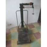 A set of industrial cast iron sack scales