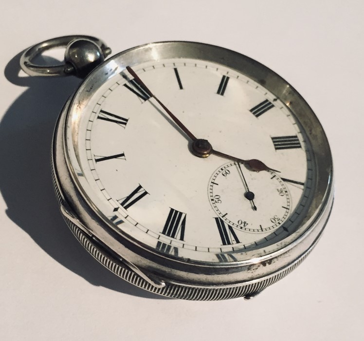 A hallmarked silver pocket watch with key - Image 2 of 4