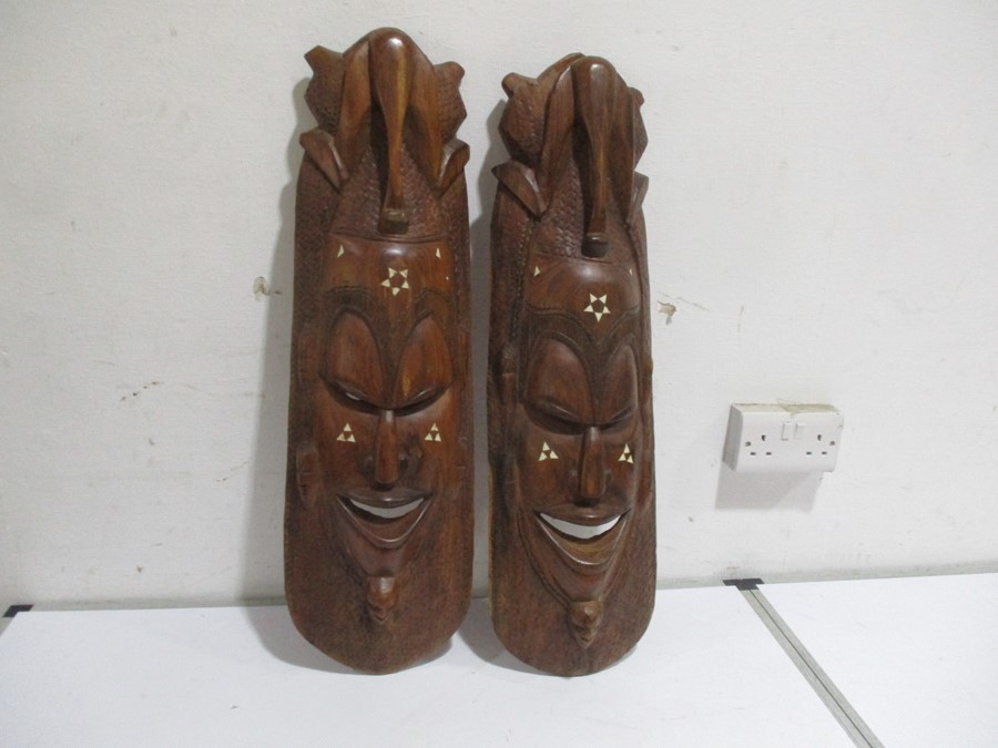 Two African wall hanging masks
