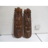 Two African wall hanging masks