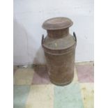 A vintage United Dairies milk churn