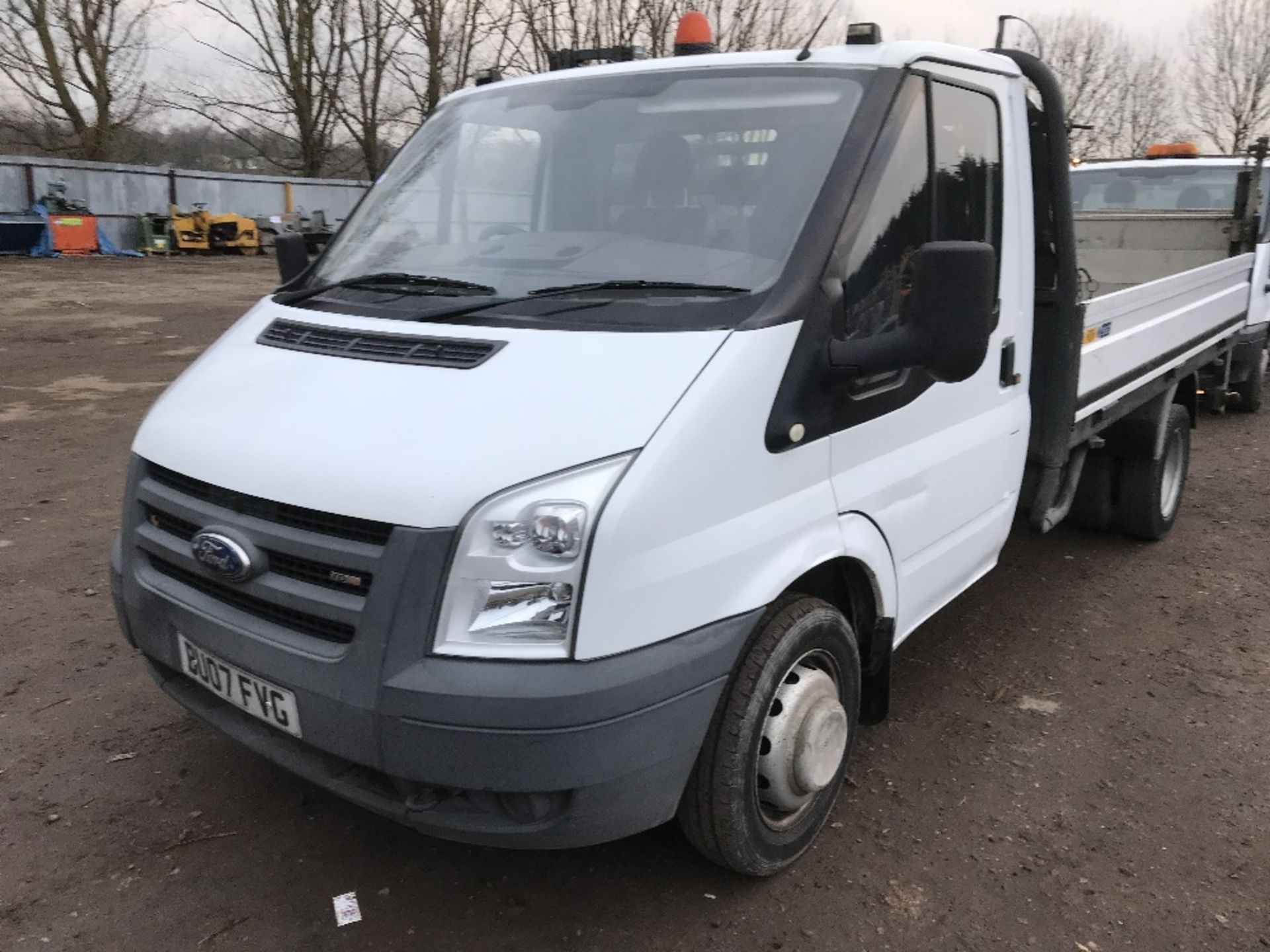 FORD TRANSIT FLAT BED DROP SIDE TRUCK WITH TAIL LIFT REG:BU07 FVG DIRECT EX COMPANY AS PART OF THEIR