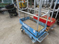 POPUP POWERED SCISSOR LIFT UNIT. WHEN TESTED WAS SEEN TO LIFT AND LOWER, BATTERY LOW