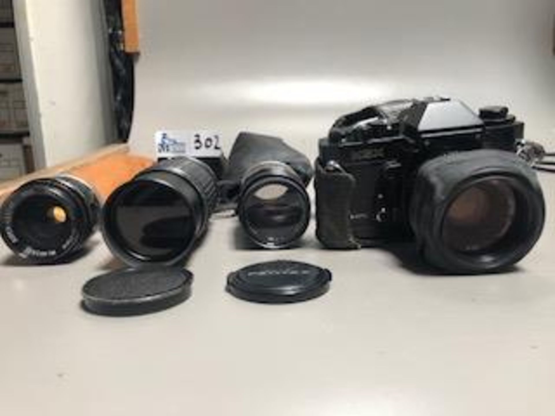 LOT OF 4 CAMERA AND LENSES