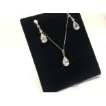 9ct white gold CZ pendant and earrings suite.