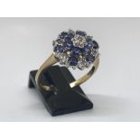 9ct yellow gold tanzanite and diamond ring.