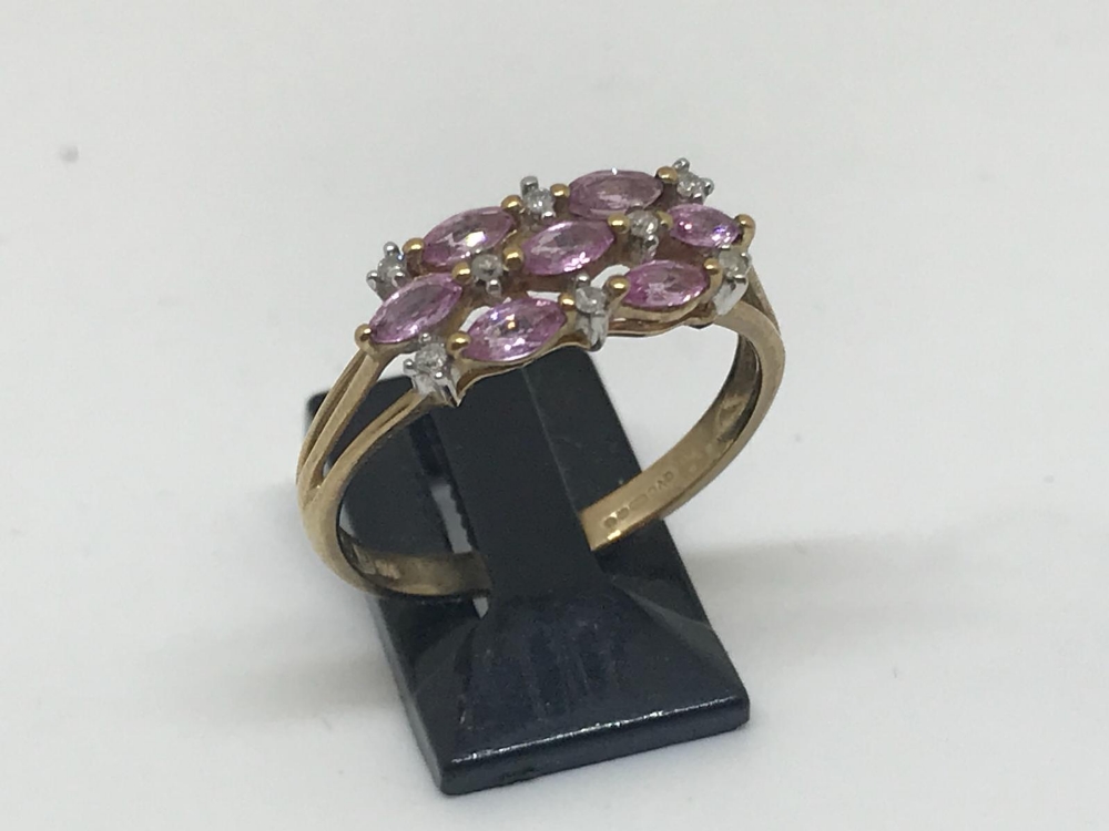 9ct yellow gold pink sapphire and diamond ring.