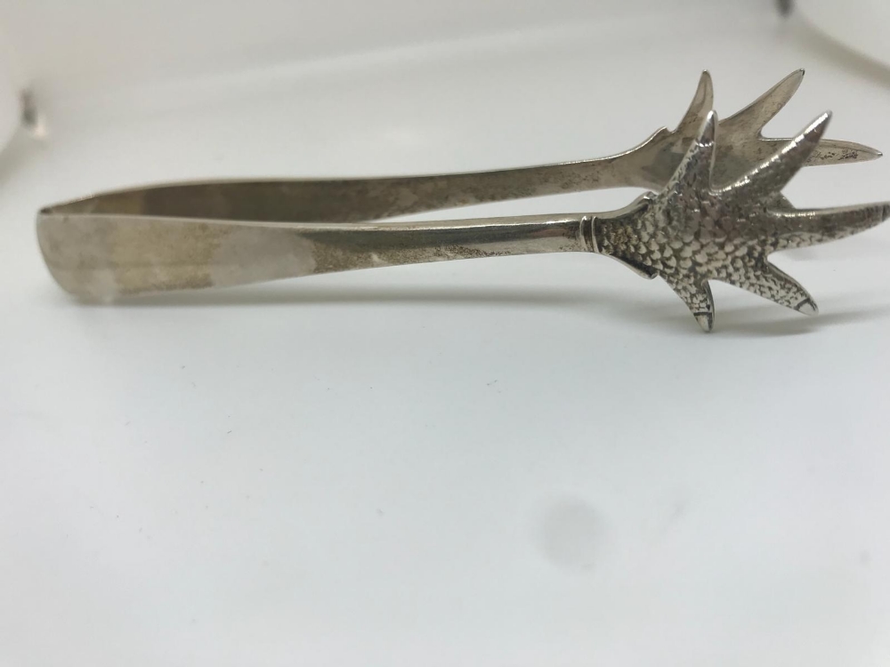 Silver sugar tongs