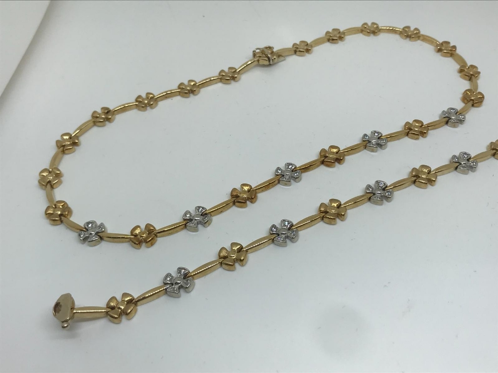 9ct yellow / white gold necklace with matching bracelet set.