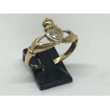 9ct yellow gold and diamond claddagh ring