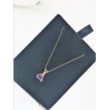 14ct yellow gold amethyst and diamond pendant.