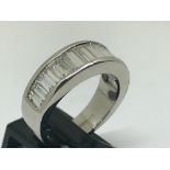 Modernist 18ct white gold baguette diamond ring