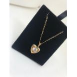 9ct yellow gold heart CZ pendant