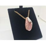 18ct rose gold contemporary pendant with chain and inset with pink sapphires and diamonds