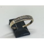 9ct yellow gold and diamond ring