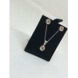 18ct white gold pendant & earring suite