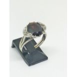 18ct white gold garnet and diamond ring