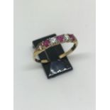 9ct gold CZ and ruby ring.