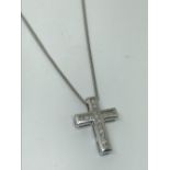 18ct gold and diamond cross pendant