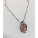 18ct diamond and pink sapphire pendant and chain.