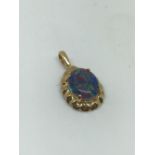 Silver gilt opal triplet pendant