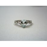 Silver aquamarine and diamond ring