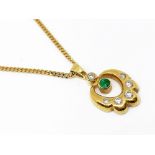 18ct gold diamond and emerald pendant and chain