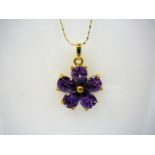 Gold / silver amethyst floral pendant