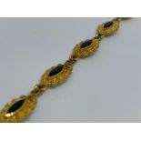 18ct gold sapphire set bracelet