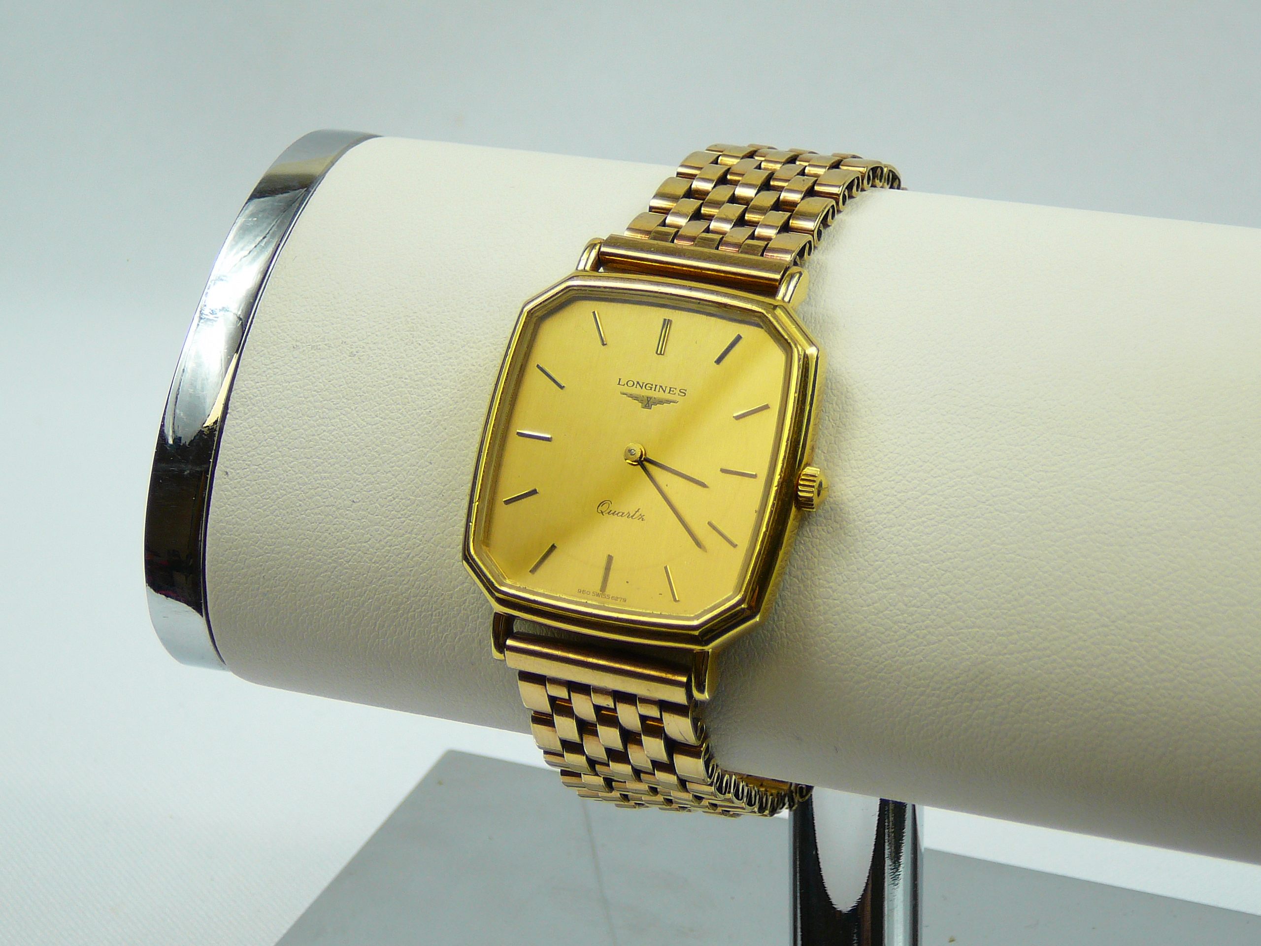 Gents Longines wrist watch on gold bracelet